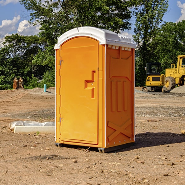 how often are the portable restrooms cleaned and serviced during a rental period in Sharon VT